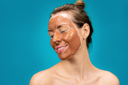 canva-woman-with-clay-mask-on-face-MAD1uEYtVv0